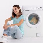 woman-listening-music-doing-laundry_23-2148246546